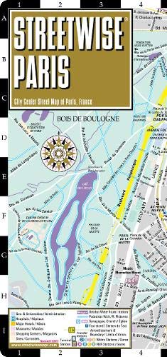 Folded, laminated Paris street map with detailed roads and a compass rose.