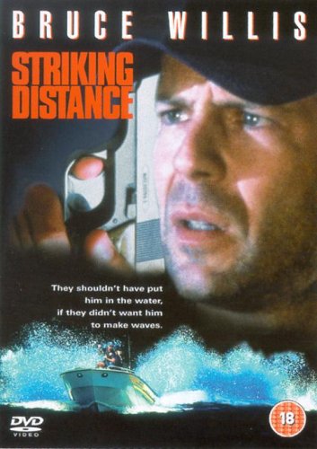 “Striking Distance” DVD cover featuring Bruce Willis with a handgun and boat.