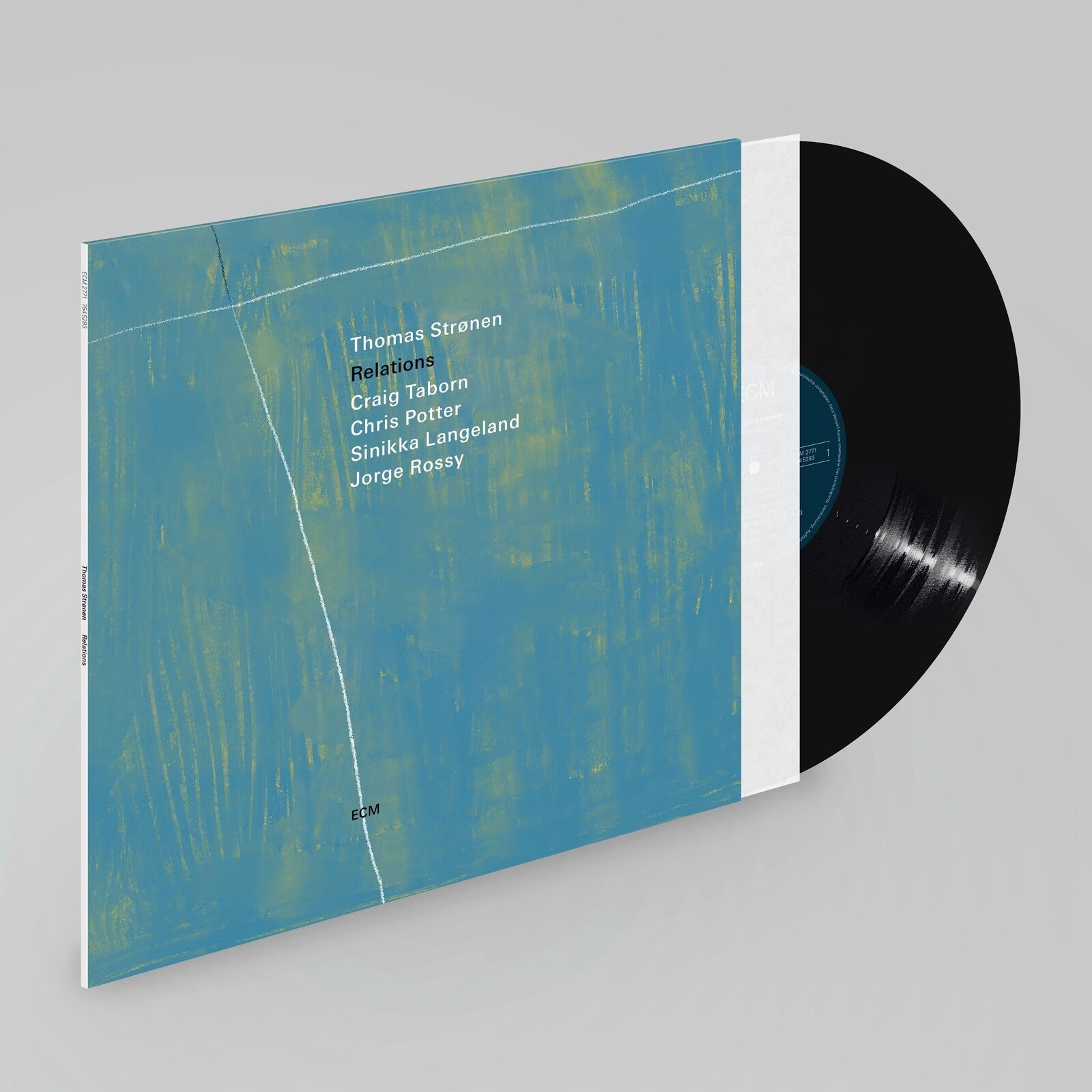 Vinyl record and album cover with abstract blue and yellow design.