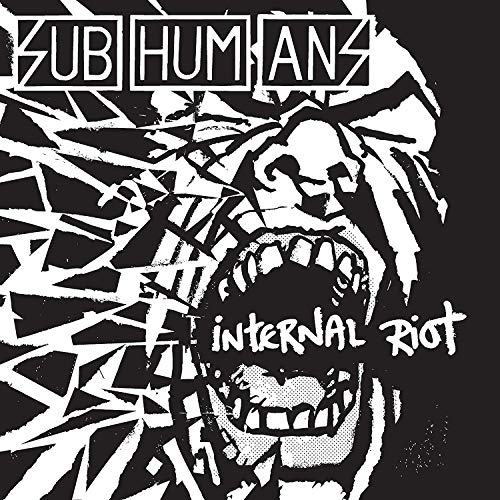 Black and white album cover with snarling wolf and fractured design.