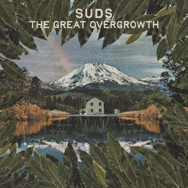 Album cover showing a house by a lake, snowy mountain, rainbow, framed by leaves.