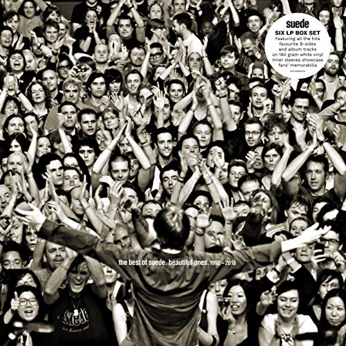 Black and white album cover with a crowd and a central figure with arms outstretched.