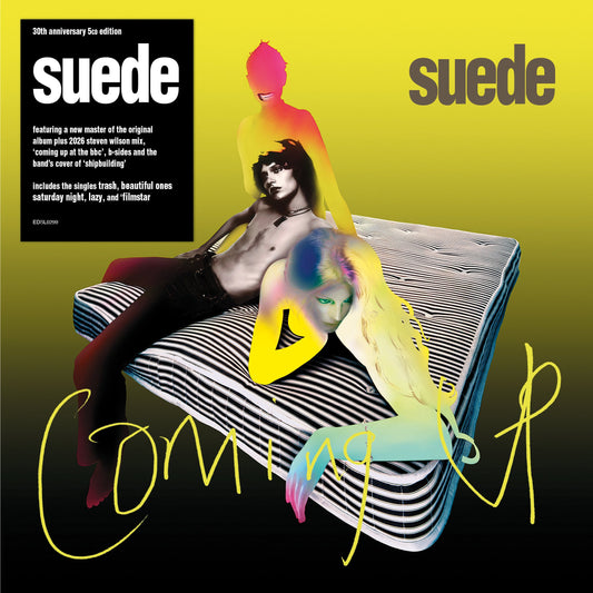 Suede “Coming Up” 5CD edition cover with band members in vibrant colors.