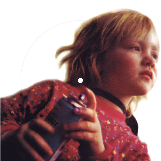 Vinyl record cover featuring a portrait of a young boy with dreadlocks.