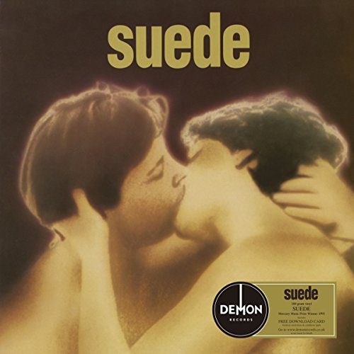 "Album cover featuring two men kissing, with 'suede' text at the top."