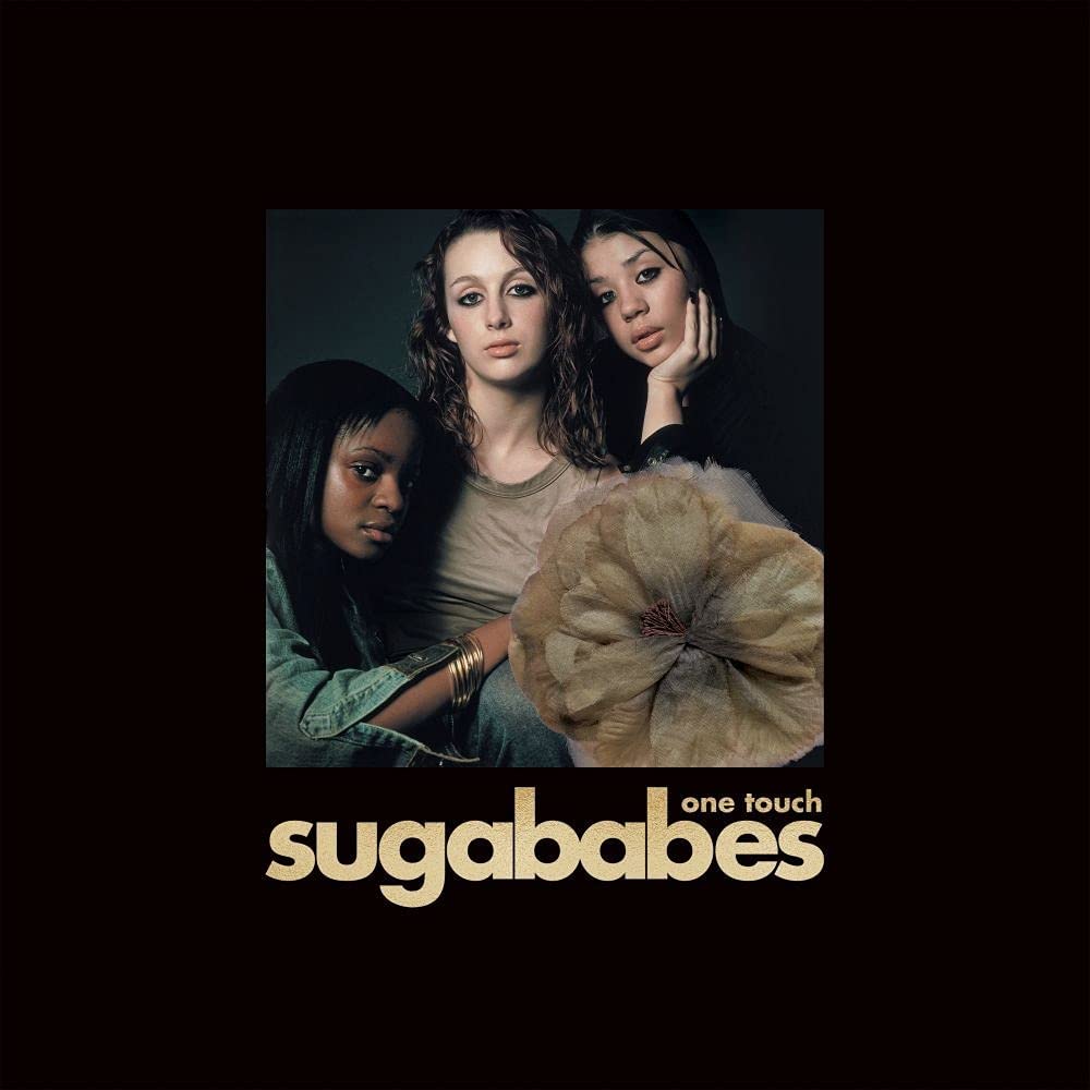 Sugababes album cover featuring three women and a large flower.
