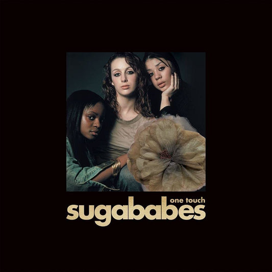 Sugababes album cover featuring three women and a large flower.