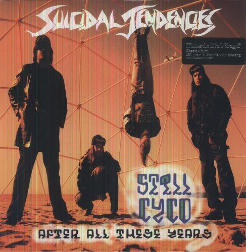 "Album cover with four men in dark clothing, one hanging upside down, in a geodesic dome."