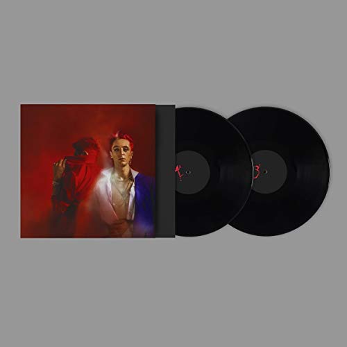 Vinyl record set with album cover featuring a person in red lighting.