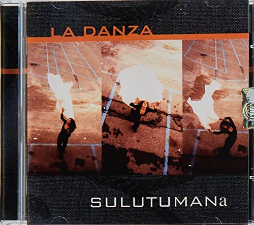 CD cover with dancers silhouetted against a blurred, fiery background.