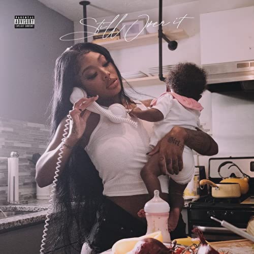 Summer Walker album cover: woman holding baby, talking on a phone.