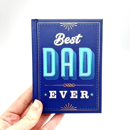 Blue “Best Dad Ever” journal held in a hand, white lettering.