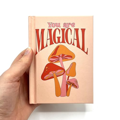 Pink book cover with "You Are Magical" text and mushroom illustration.