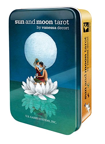 Tin containing "Sun and Moon Tarot" cards with moon and couple imagery.