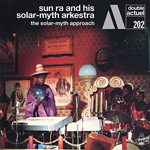 Sun Ra album cover featuring musicians with unusual instruments and decor.