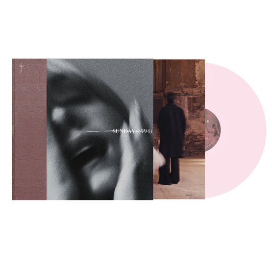 Vinyl record of Sunday’s “Devotion” (1994) with album cover and pink disc.