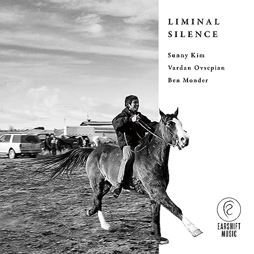 Black and white album cover featuring a person riding a horse.