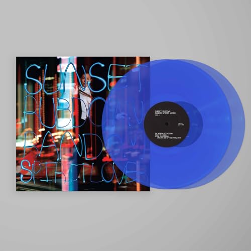 Blue vinyl record with album cover featuring neon text and a figure.