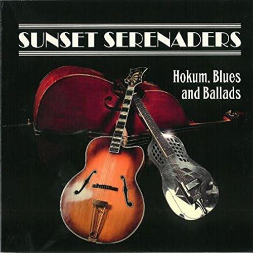 CD cover featuring an upright bass, an acoustic guitar, and a resonator guitar.