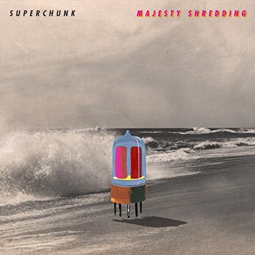 Superchunk's "Majesty Shredding" CD cover: ocean waves with a glowing tube.