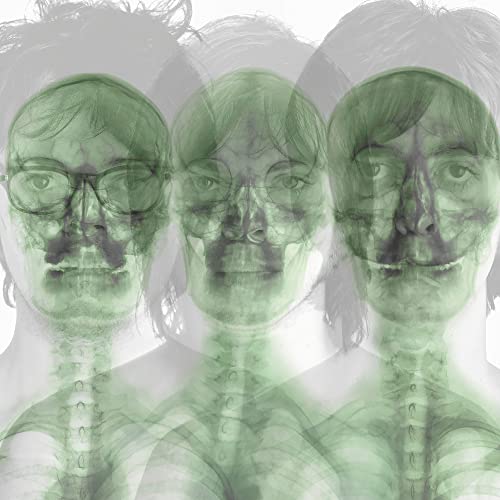 Supergrass album cover featuring a repeated, translucent portrait of a man.