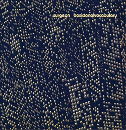 Vinyl record cover with a dark blue background and gold dot pattern.