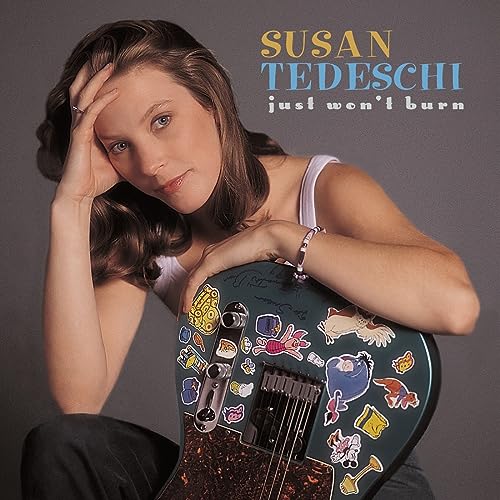 Susan Tedeschi album cover featuring a woman with a decorated guitar.
