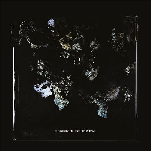 Dark abstract art on a CD case with band and album title text.
