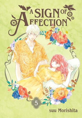 Manga book with colorful cover, featuring a romantic scene with young woman and man.