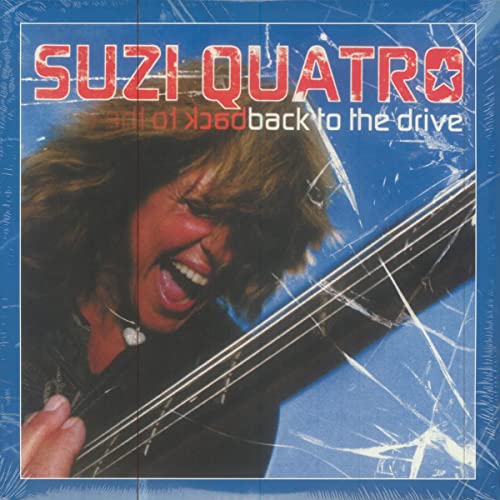 Suzi Quatro album cover, showing her playing a bass guitar.