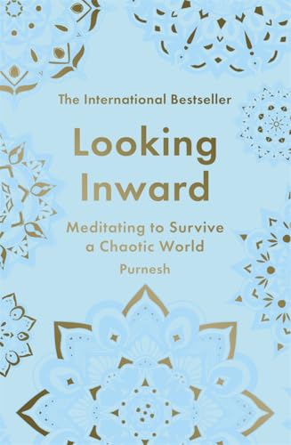 Book cover: "Looking Inward" with pale blue background and gold floral patterns.
