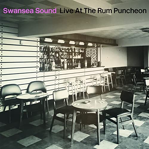 Black and white vinyl album cover depicting an empty bar interior.