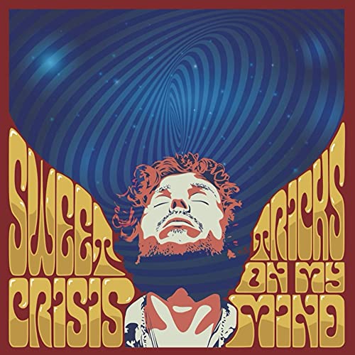 CD cover: clown face with swirling blue and gold psychedelic background.