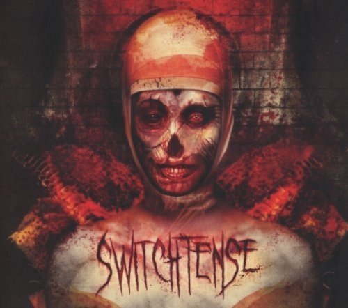 CD cover: pale, monstrous face with red eyes and bloody details.