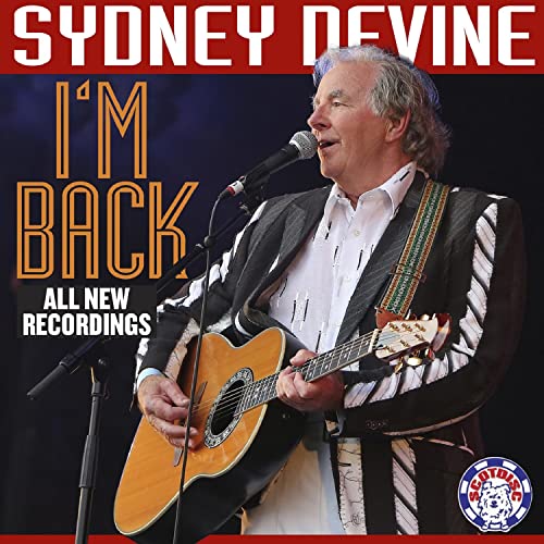 Sydney Devine album cover featuring the singer with a guitar and microphone.