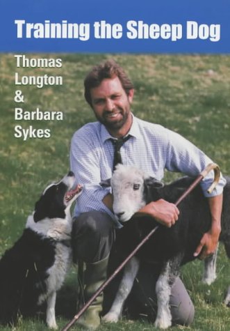 Dog training book with sheep dog on cover, likely outdoors with rural scenery background.