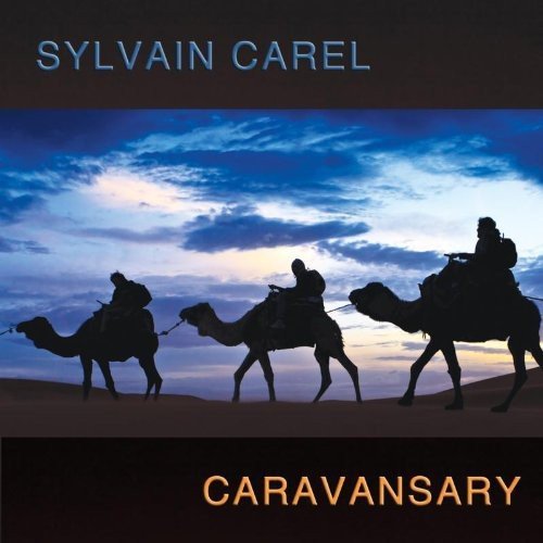 CD cover: silhouetted camel caravan against a blue and orange sky.