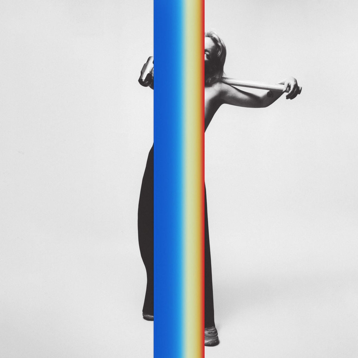 Black and white portrait split by a vertical blue-to-red gradient.
