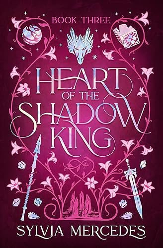 Book cover: “Heart of the Shadow King” with ornate floral design.