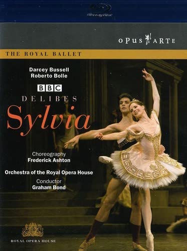 Ballet performance cover featuring Darcey Bussell and a male dancer in costume.