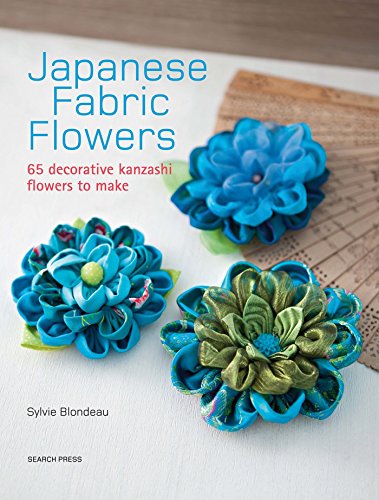 Book cover featuring three handmade blue and green kanzashi fabric flowers on a surface.