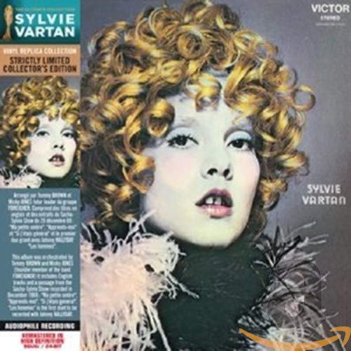 CD cover for Sylvie Vartan’s “Aime-Moi,” featuring a portrait of the singer.