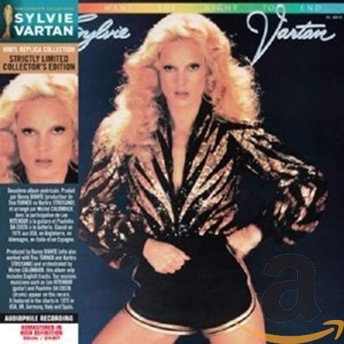 Sylvie Vartan CD cover featuring a blonde woman in a sparkly jacket.