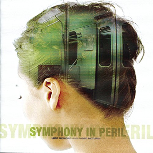 CD cover: profile of a head with a train image inside.