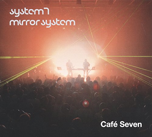 "CD cover with concert scene, stage lights, and crowd, titled 'Cafe Seven'."