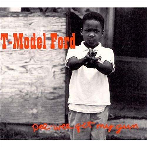 Black and white album cover featuring a young boy holding toy guns.