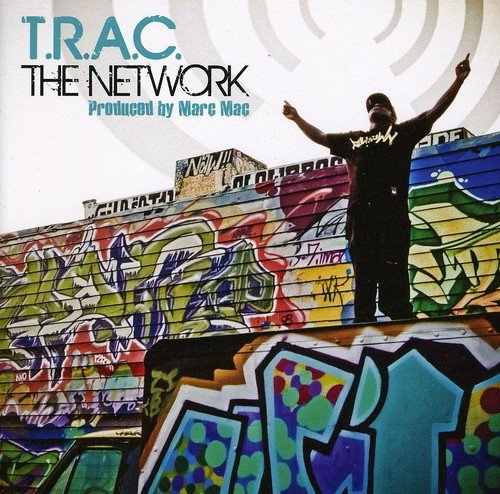 "Album cover with a man standing on graffiti-covered wall, arms raised, against a white background."