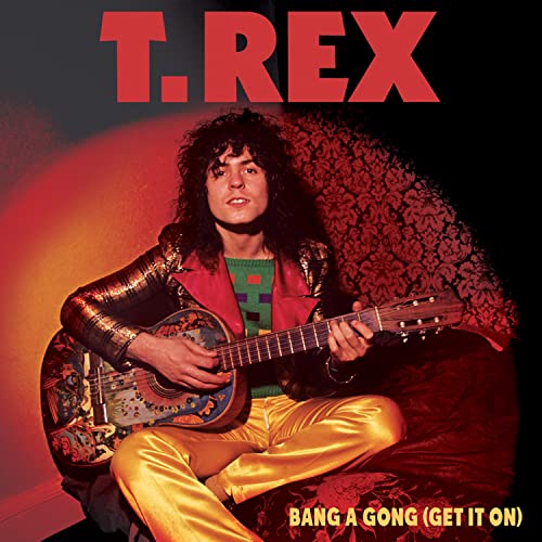 Marc Bolan of T. Rex playing a guitar, album cover art.