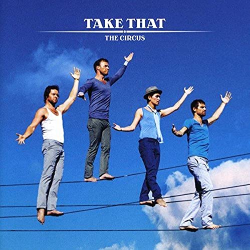 Four men walking on tightropes against a bright blue sky, Take That album cover.