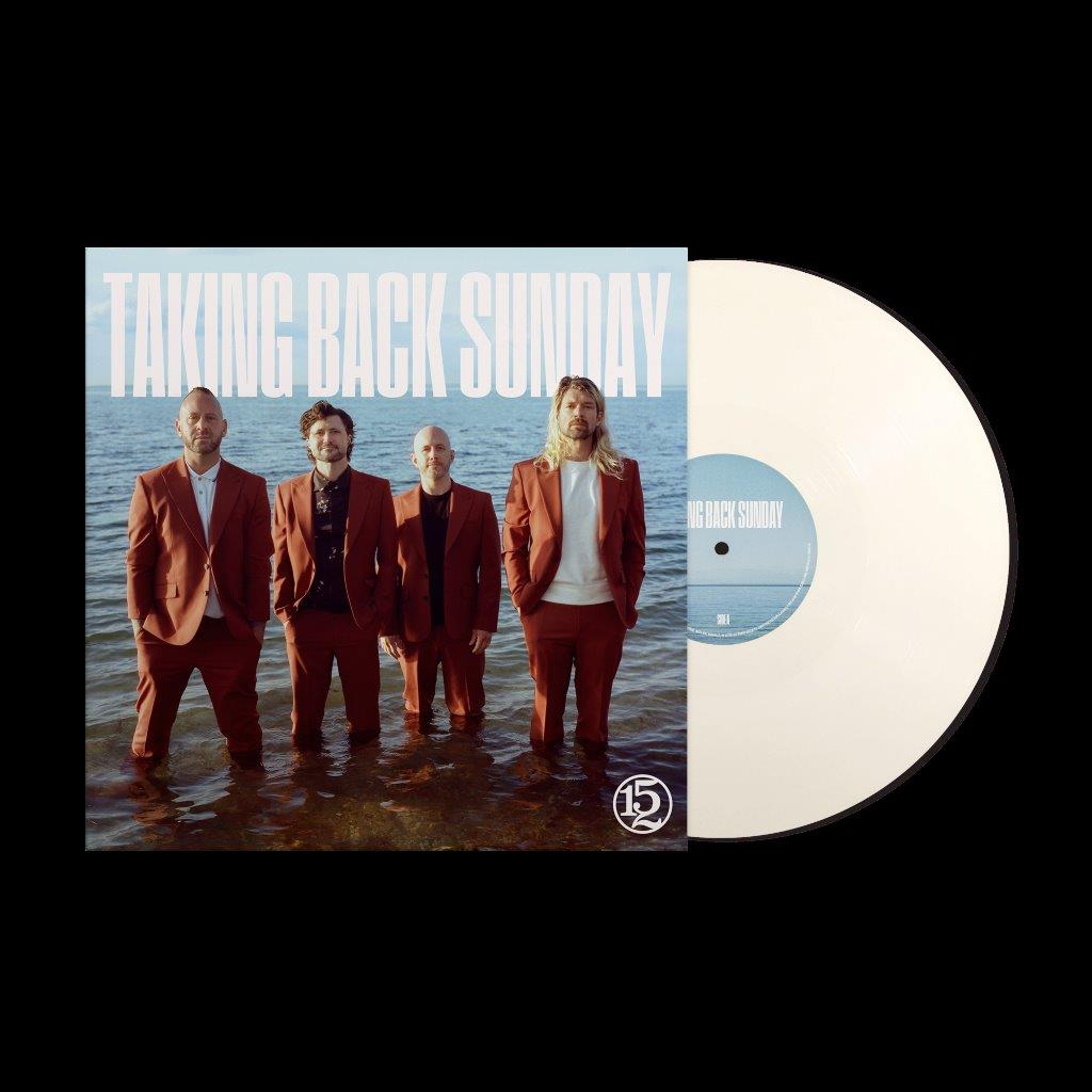 Four men in suits standing in shallow water, vinyl record partially visible.